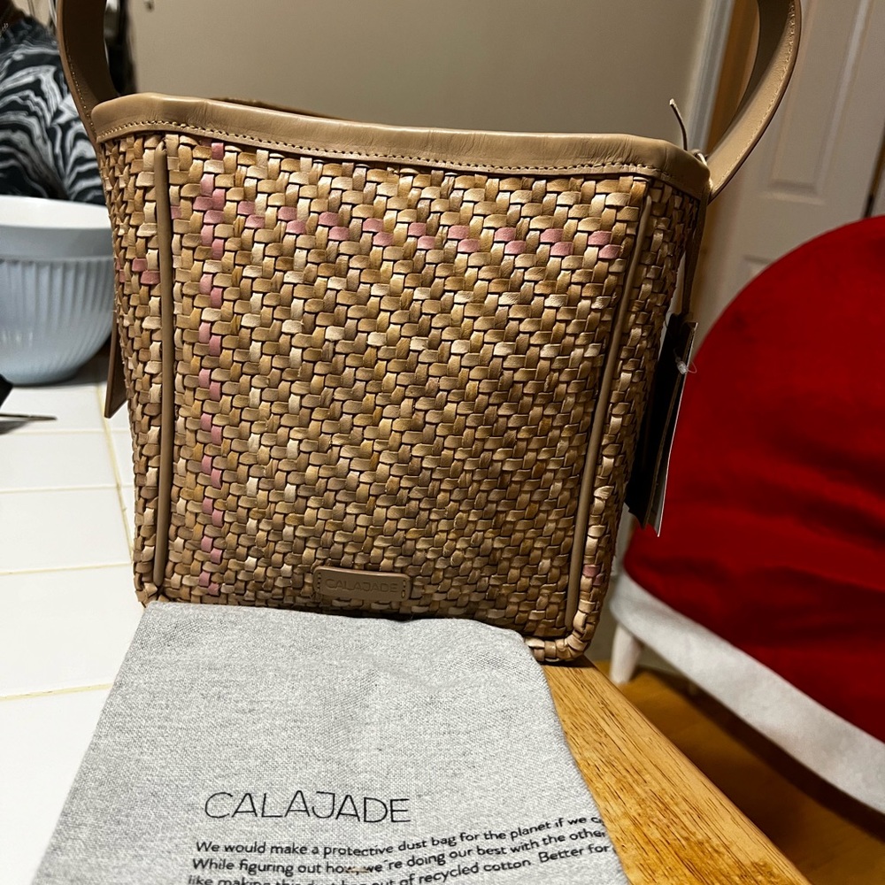 Calajade purse. Brand new with tags and dust bag.